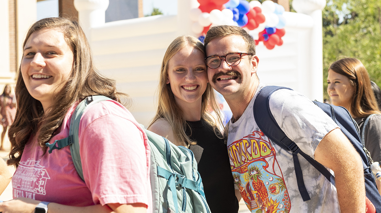 Students walk to class through the Grove on the first day of the 2023 Spring Semester.